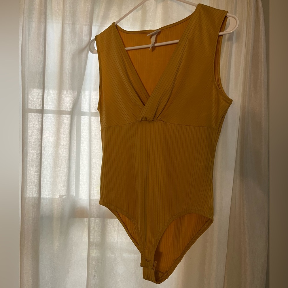 Gold bodysuit